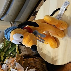 Disney Pirates of the Caribbean Pluto plush.